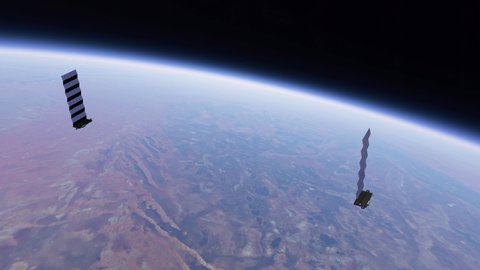 Fleet of Internet starlink satellites in orbit over earth. Animation of a line of satellites providing internet connection from space. Aerial view of satellites above earth.