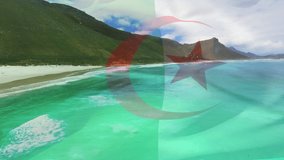 Animation of flag of algeria blowing over beach landscape. travel, holidays, patriotism and celebration concept digitally generated video.
