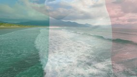 Animation of flag of italy blowing over seascape. travel, holidays, patriotism and celebration concept digitally generated video.