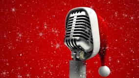 Animation of santa's hat on retro microphone over snow falling on red background. christmas, tradition and celebration concept digitally generated video. - Powered by Shutterstock - Get 15% off with code: PIKWIZARD15