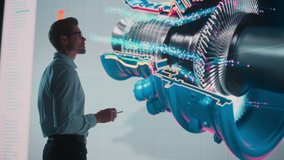 Innovative Green Energy Startup: Engineer Designing Engine Using Tablet Computer and Big Wall Screen to Analyse Prototype. Concept for Sustainable Environmnetally Friendly Carbon Neutral Turbine - Powered by Shutterstock - Get 15% off with code: PIKWIZARD15