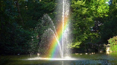 FRANCE, NANTES -  September 12,  2017: Rainbow in the fountain. The Botanical Garden is located across the street from Nantes Railway Station