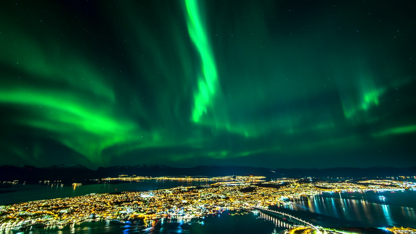 Northern Lights over Tromso city, Norway - time-lapse from Fjellheisen viewpoint Royalty-Free Stock Footage #1078715051