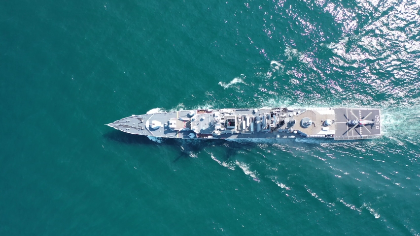 Aerial view of naval ship, battle ship, warship, Military ship resilient and armed with weapon systems, though armament on troop transports. support navy ship. Military sea transport.