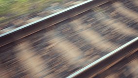 Railroad tracks in motion. Travel by train