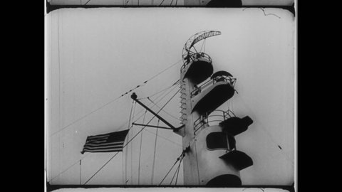 1940s Pacific Ocean. Montage of radio-based detection systrems or Radar devices used during World War 2. Radar Antenna on Battleship. 4K Overscan of Vintage Archival 16mm Film Print