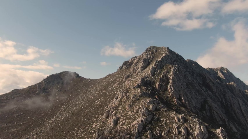 Steep Rocky Hills With Clear Blue Sky During Daytime In South Africa. - Aerial