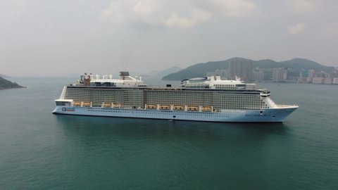 HONG KONG , China - 08 28 2021: Royal Caribbean Spectrum of the seas mega Cruise Ship anchored at Hong Kong bay.