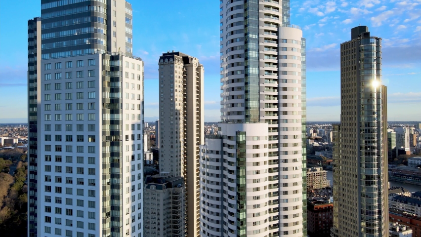 Aerial dolly in towards skyscrapers at Puerto Madero, Buenos Aires. High-rise apartment buildings