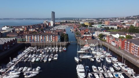Editorial Swansea, UK - September 07, 2021: Swansea city marina showing the coastal development and the sweep of Swansea Bay.