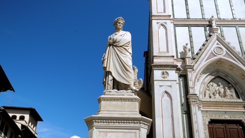 Famous statue of Dante Alighieri in front of Basilica Santa Croce Square in Florence Tuscany Italy