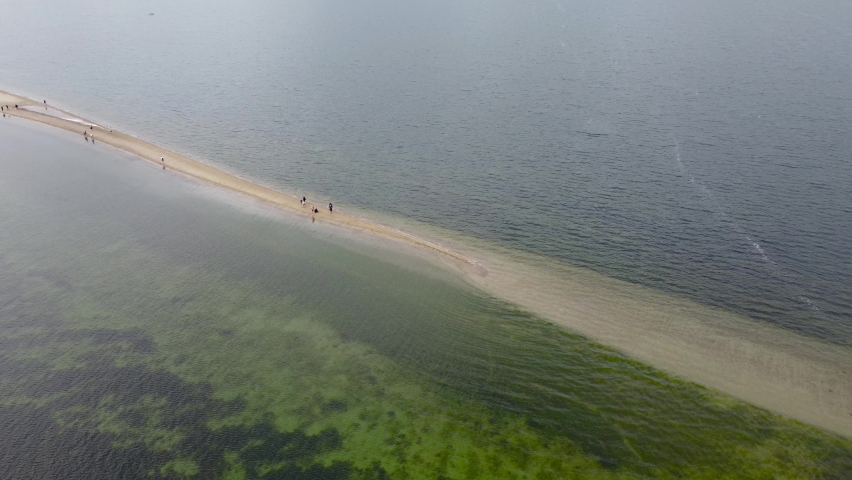 Drone aerial panning around Rawa Peninsula on Baltic Sea in Poland.