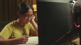 Bored Asian Girl Student Distance Learning, Learn Online On Computer From Home
