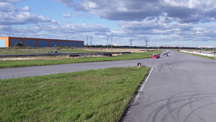 Cars participate in auto racing
