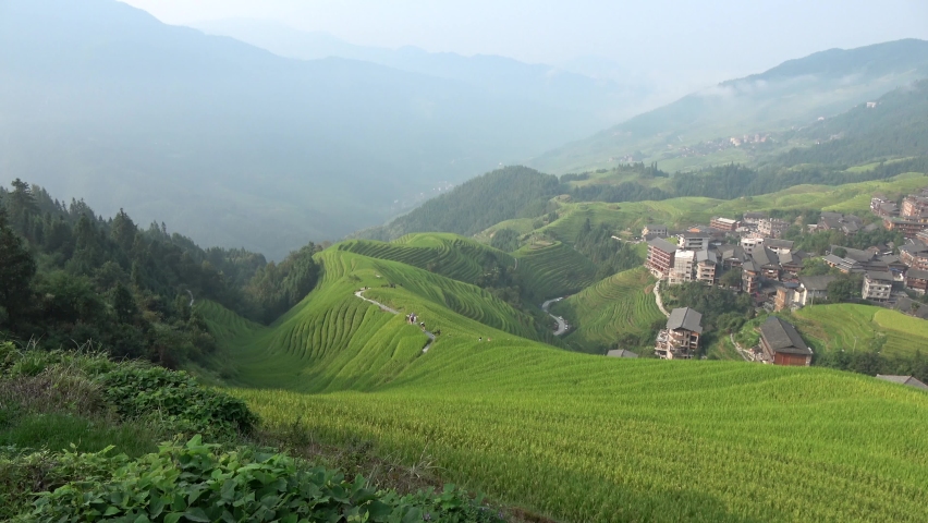 Aerial view of Guilan Rice terraces are pieces of sloped planes that has been cut into a series of successively receding flat surfaces which resemble steps for the purposes of more effective farming