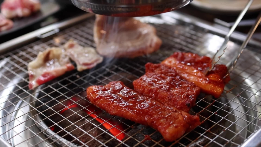 Grilled Pork Beef Korean BBQ In Restaurant | Shutterstock HD Video #1078846526