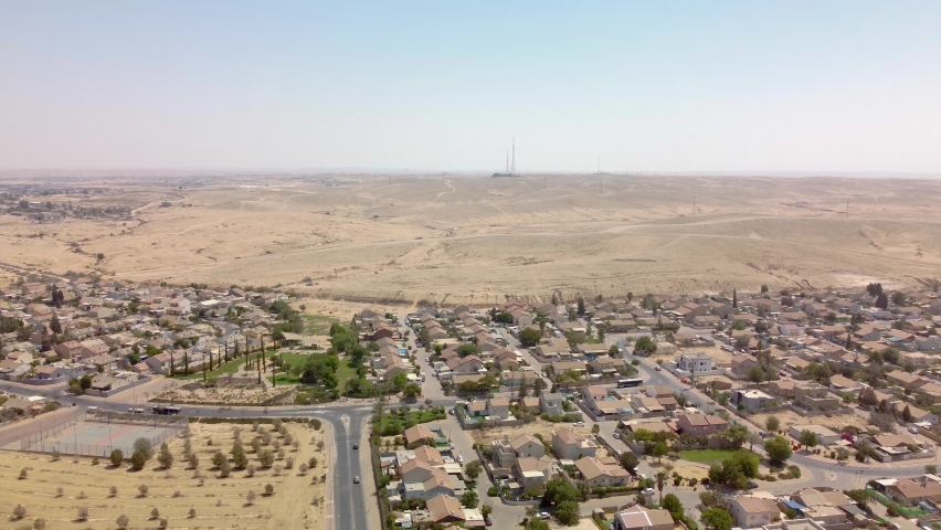 Landing to road in a district with private buildings in Beer-Sheba city