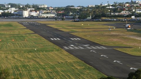 Small plane lands at Nouméa Magenta Airport Grand Terre, New Caledonia.