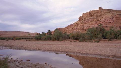 Pan right, Ait Ben Haddou kasbah from the river viewpoint in Morocco, Africa