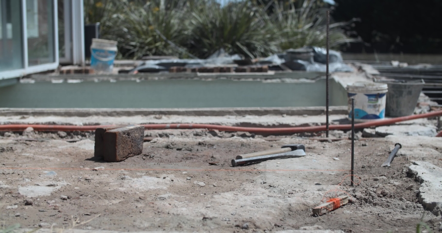 Pool under construction - Empty hotel under construction - Dusty construction vibes - 4k Slow motion