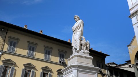 Famous statue of Dante Alighieri in front of Basilica Santa Croce Square in Florence Tuscany Italy