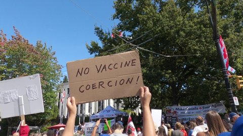Vancouver, Canada - September 8,2021: View of sign No Vaccine Coercion during the rally against the BC Vaccine Card in front of Vancouver City Hall