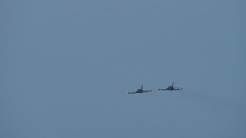 Maribor Airshow Slovenia AUGUST, 15, 2021 Pair of light combat aircraft and advanced jet trainer airplane doing rolls. Aero Vodochody L-159 ALCA of Czech Air Force 