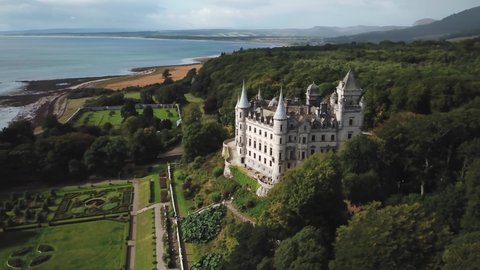 Aerial view by drone of beautiful Dunrobin Castle and garden in highlands of Scotland, UK. 