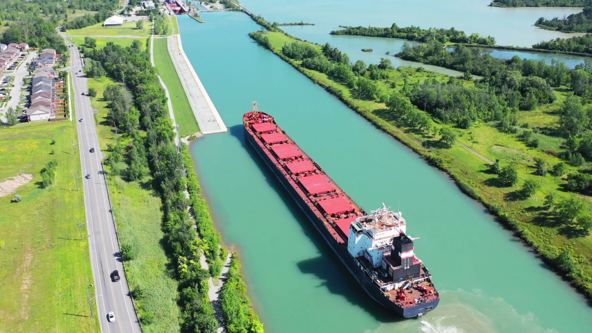 Aerial of a Lake Freighter sailing in the Welland Canal, Canada 4K