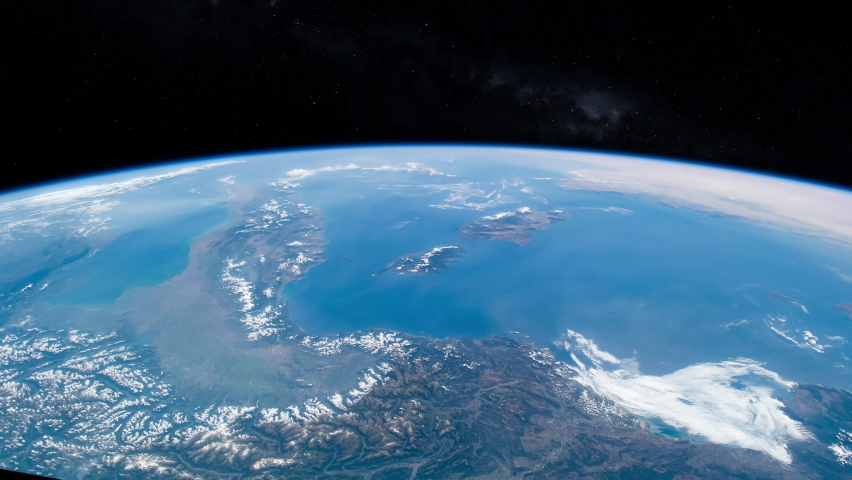 Flying over mediterranean sea, Italy and Sardinia and Sicily islands, view from orbit satellite time lapse animation. Images furnished by Nasa