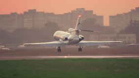 Business jet (private jet) is landing at sunset  - Powered by Shutterstock - Get 15% off with code: PIKWIZARD15