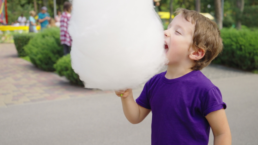 All children enjoy sweets. Eat Candy Floss.