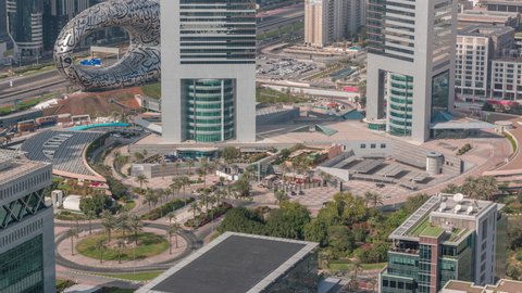 Emirates Towers with museum of future and Sheikh Zayed road aerial timelapse