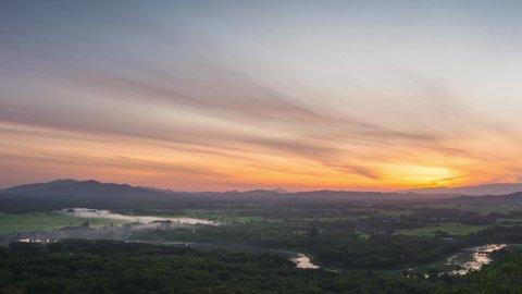 Timelapse 4K. Beautiful landscape in the morning mist from the viewpoint of Wat Phra That Doi Phra Chan Mae Tha Lampang, Thailand, tourism.