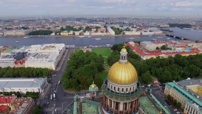 Top view of St. Isaac's Cathedral in St. Petersburg, Russia. View of Vasilievsky Island, Peter and Paul Fortress, Lakhta Center, Neva River and other tourist attractions in summer. Aerial. 4K Video