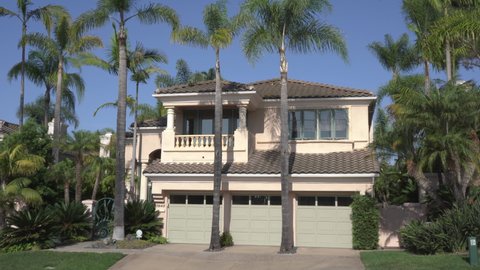 Luxury Southern California home with palm trees. Video taken in Carlsbad, CA USA on September 10, 2021.
