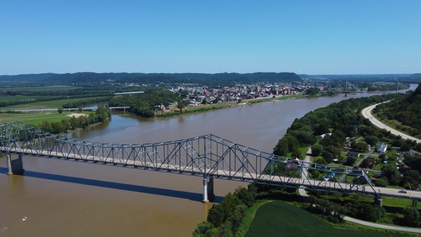 Carl Perkins Bridge crossing the Ohio River from Kentucky, aerial drone footage
