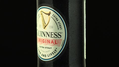 LVIV, UKRAINE - August 24, 2021: Guinness beer in a bottle