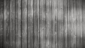 video clip features a wooden planks background with natural lights and shadows 