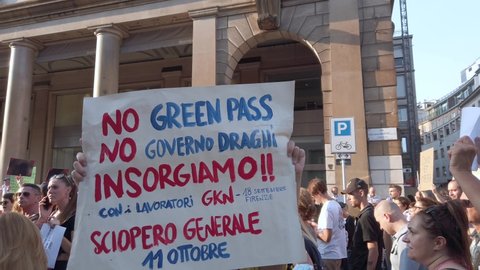 Europe, Italy, Milan September 2021 - No Vax protest against Green Pass digital passport for Covid-19 Coronavirus after vaccination in Piazza Fontana Duomo 