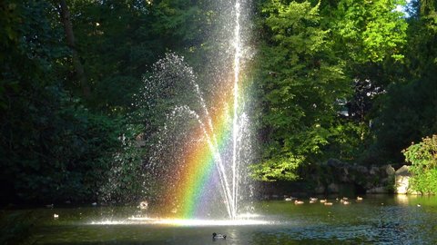FRANCE, NANTES -  September 12,  2017: Rainbow in the fountain. The Botanical Garden is located across the street from Nantes Railway Station