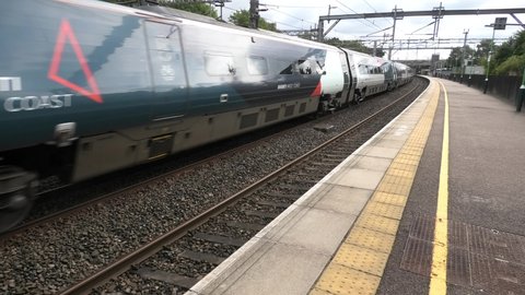Lichfield, Staffordshire, Uk-Sept 11 2021: 
Avanti West Coast Class 390 Pendolino hammering through Litchfield Trent railway station