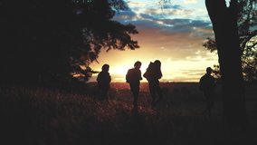 hiker group. team of hikers with backpacks silhouette walk through the forest. nature travel a adventure concept. hiker lifestyle group with backpacks walk on the sunset. mountain outdoor view - Powered by Shutterstock - Get 15% off with code: PIKWIZARD15