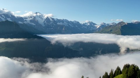 4K Timelapse of Clouds Inversion, Jungfrau Mountain and Lauterbrunnen Valley from Schynige Platte, Switzerland