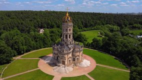 The Znamensky Temple is a unique monument of Russian architecture of the late XVII-early XVIII centuries. A pillar-shaped white stone building made in the Baroque style. Shooting from a drone. General