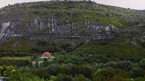 Old Balkan national house on the hill. I dry clothes on the rope. 4k video