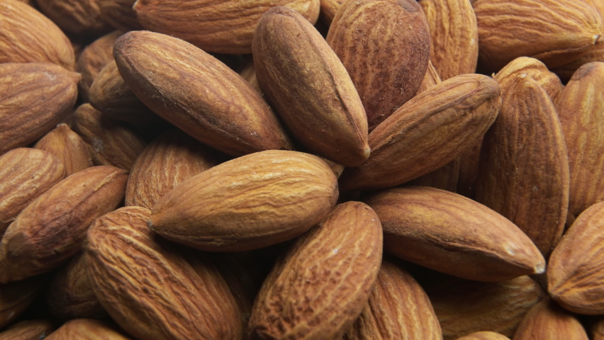 Almond nuts close up rotate in a circle Royalty-Free Stock Footage #1079059199