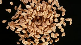 Super Slow Motion Shot of Rotating Roasted Peanuts. Filmed on High Speed Cinematic camera at 1000 fps. - Powered by Shutterstock - Get 15% off with code: PIKWIZARD15