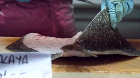 Fishmonger Filleting Flatfish. High quality video
