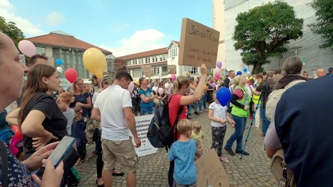 Gifhorn, Germany, September 11, 2021: Protest by parents and children against face masks and mandatory vaccination through the back door for school children